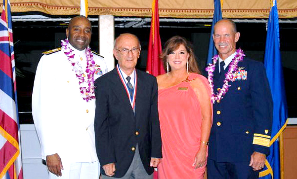 George Villa, center left, and USO Hawaii Director Leigh Graham, center right, are seen at the Dec. 1 Service Salute in Hawaii. USO photo