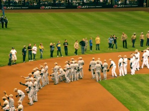 Fifty-eight troops participated in a mass first pitch May 27 at Miller Park in Milwaukee. USO photo