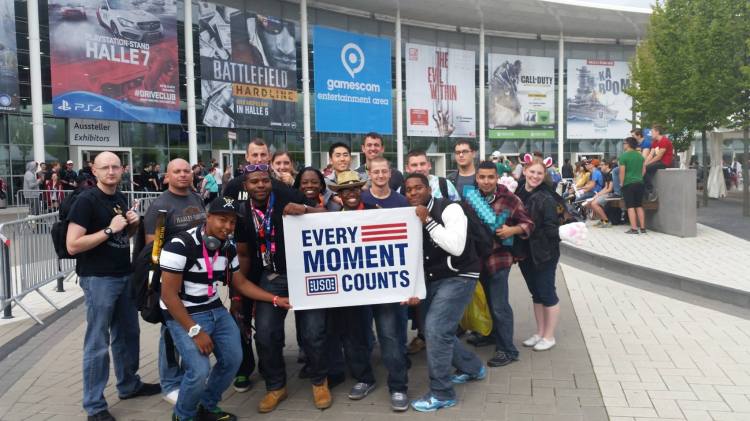 Troops smile outside of the gamescom convention. USO photo.