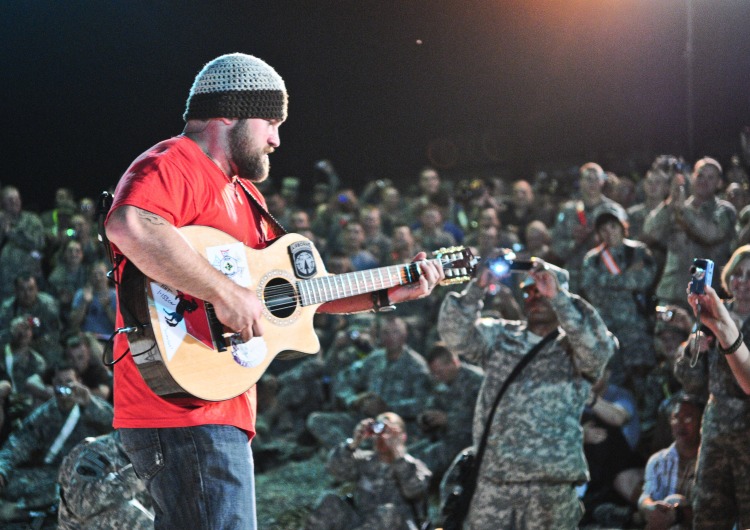 Country music singer Zac Brown gets up close and personal with troops during a USO show in Mosul, Iraq, on April 16, 2010. (USO Photo by Erick Anderson)
