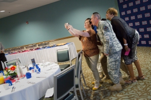 Brooks, far right, takes a selfie as part of an icebreaker activity.