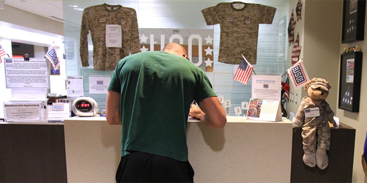 A service member signs in at the USO Las Vegas center at McCarran International Airport. 